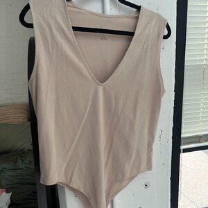 Two for one special! Two bodysuits, size XL, one tan one green.